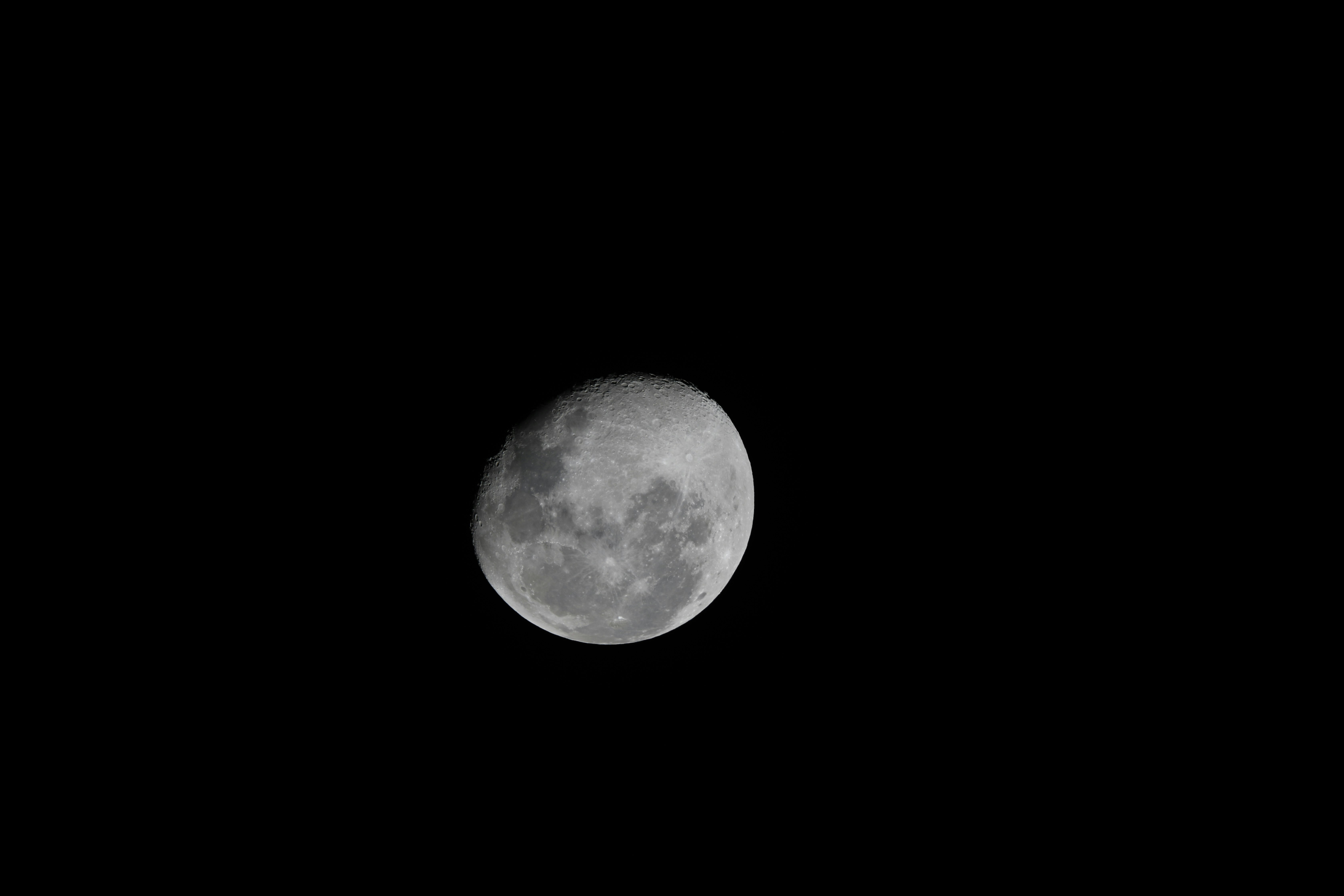 full moon in dark night sky